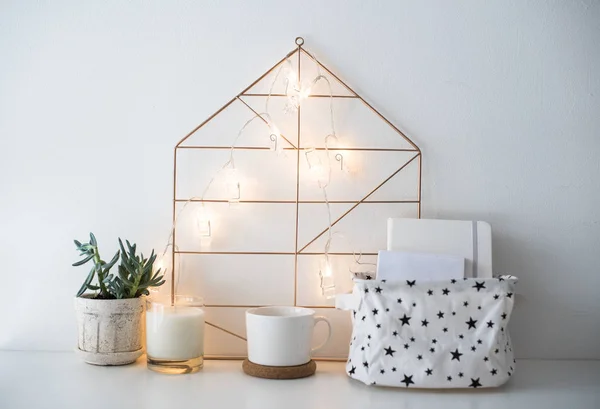 Minimalist scandinavian home decor, storage box and string light — Stock Photo, Image