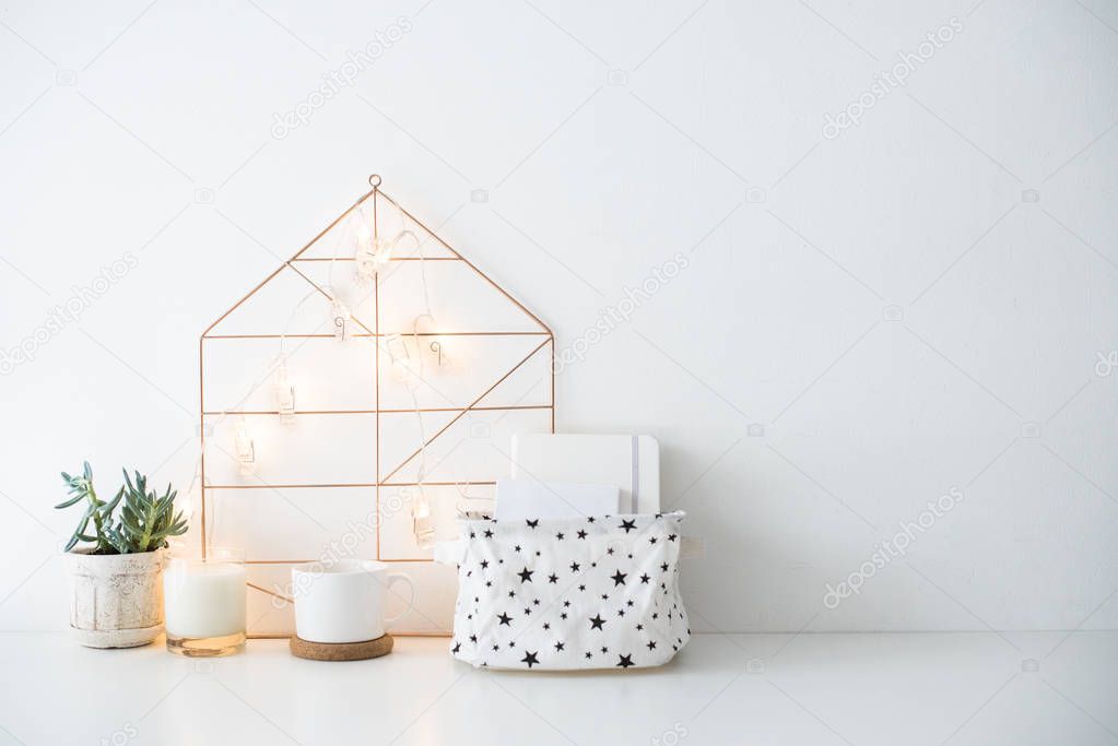Minimalist scandinavian home decor, storage box and string light