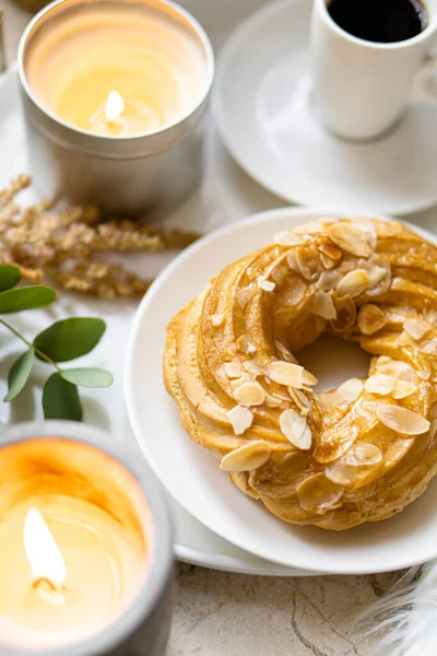 Simple real breakfast with coffee and custard cake on white plate — Stock Photo, Image