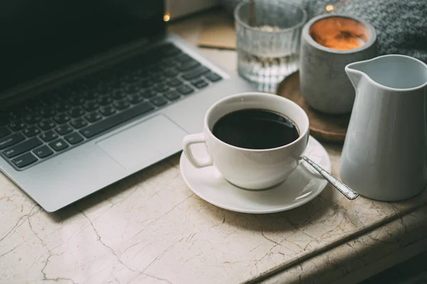 Cozy freelancers winter work place at home with cup of coffee — Stock Photo, Image