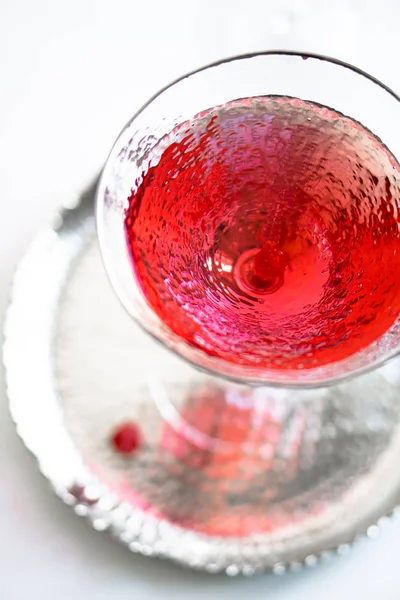 Classic red cocktail in crystal texture glass on white background — Stock Photo, Image