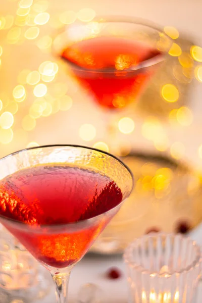 Classic red cocktail in fancy texture glass on bright light bokeh background — Stock Photo, Image