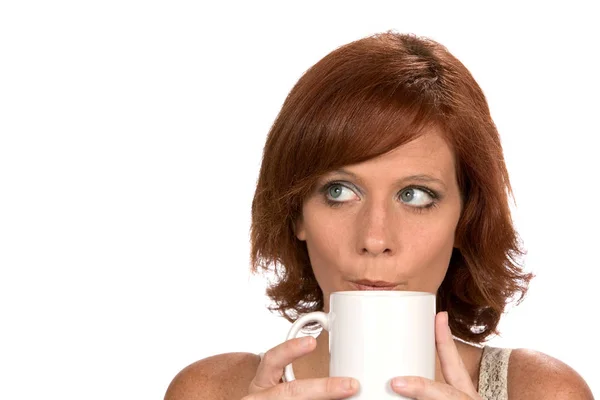 Redhead Woman Thinking With Coffee Mug — Stock Photo, Image