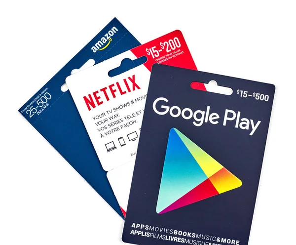 Netflix, google play und amazon geschenkkarten — Stockfoto