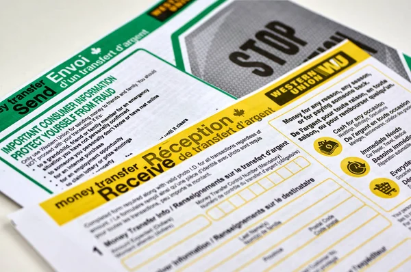 Western Union forms on a white background. — Stock Photo, Image