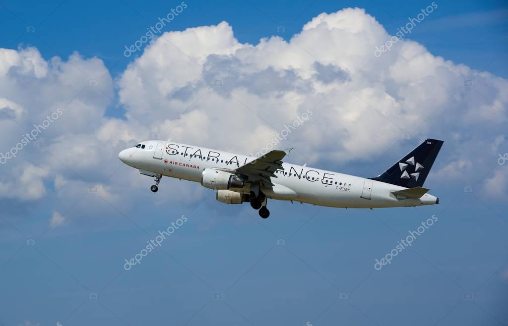 MONTREAL, CANADA - AUGUST 28, 2017 : Air Canada Star Aliance taking off plane. Star Alliance is one of the world's largest global airline alliances, founded on 14 May 1997