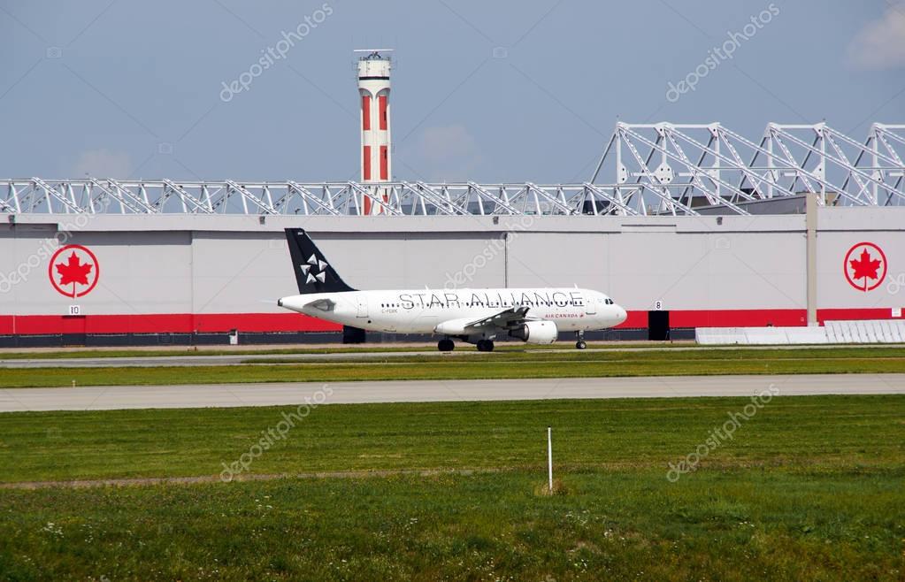 MONTREAL, CANADA - AUGUST 28, 2017 : C-FDRK Air Canada Star Aliance taxiing plane. Star Alliance is one of the world's largest global airline alliances, founded on 14 May 1997