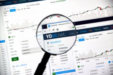 Montreal, Kanada - 23 Aralık 2017: Cryptocurrency Yobit.net exchange Pazar Web Büyüteç altında