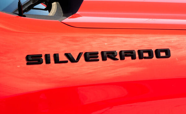 Montreal, Canada - April 4, 2020: Silverado writing and logo on truck. Chevrolet is one of the most popular and recognizable automotive brands in the US. Chevrolet is a division of General Motors