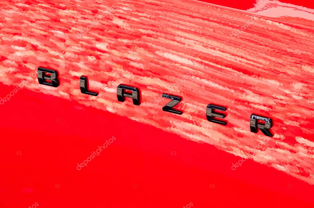 Montreal, Canada - April 4, 2020: Red Chevrolet Blazer logo and writing. Chevrolet is one of the most popular and recognizable automotive brands in the US. Chevrolet is a division of General Motors