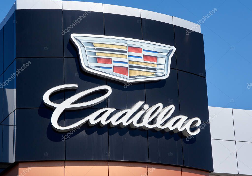 Montreal, Canada - April 4, 2020: Cadillac dealership logo and writing. Cadillac is a division of American automobile manufacturer General Motors GM that designs and builds luxury vehicles.