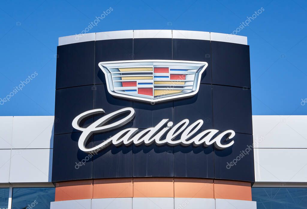 Montreal, Canada - April 4, 2020: Cadillac dealership logo and writing. Cadillac is a division of American automobile manufacturer General Motors GM that designs and builds luxury vehicles.