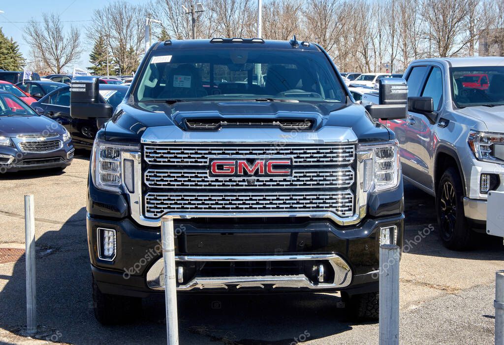 Montreal, Canada - April 4, 2020: GMC Sierra Denali car close-up. GMC General Motors Company is a division of the American automobile manufacturer General Motors GM