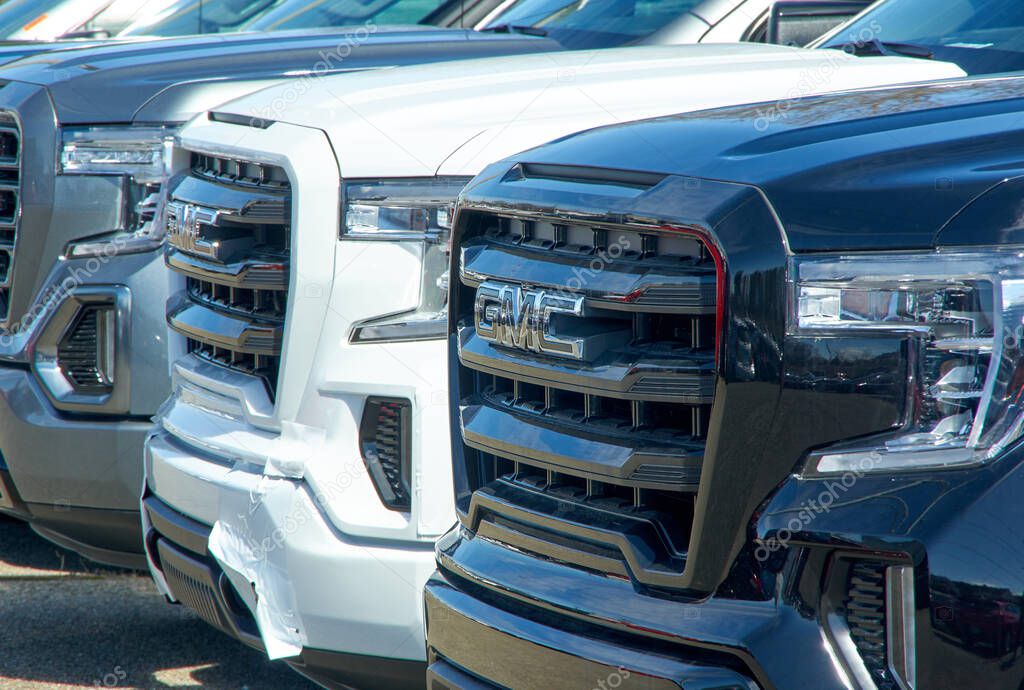 Montreal, Canada - April 4, 2020: GMC new 2020 trucks in a line at dealership. GMC General Motors Company is a division of the American automobile manufacturer General Motors GM