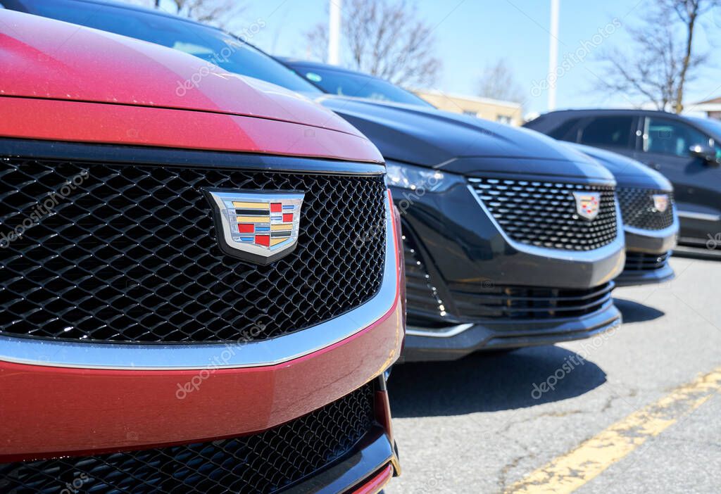 Montreal, Canada - April 4, 2020: Cadillac CT5 cars at dealership. Cadillac is a division of American automobile manufacturer General Motors GM that designs and builds luxury vehicles.