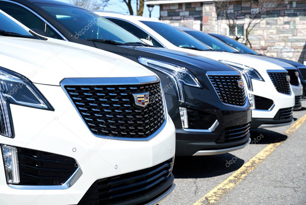 Montreal, Canada - April 4, 2020: Cadillac XT4 cars at dealership. Cadillac is a division of American automobile manufacturer General Motors GM that designs and builds luxury vehicles.