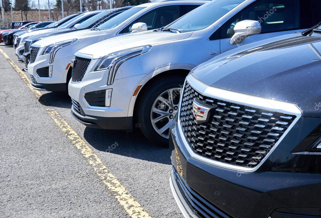 Montreal, Canada - April 4, 2020: Cadillac XT4 cars at dealership. Cadillac is a division of American automobile manufacturer General Motors GM that designs and builds luxury vehicles.