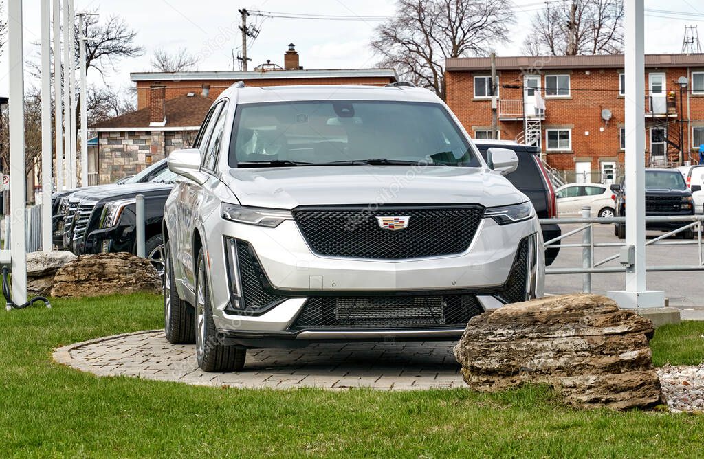 Montreal, Canada - May 2, 2020: New 2020 model of Cadillac XT6 400 car. Cadillac is a division of the American automobile manufacturer General Motors GM that designs and builds luxury vehicles
