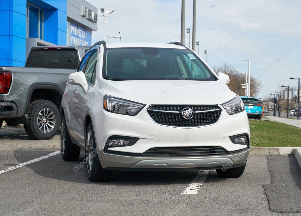 Montreal, Canada - May 2, 2020: Buick Encore 2020 car. Buick is a division of the American automobile manufacturer General Motors. Buick is positioned in between mainstream and luxury brands.
