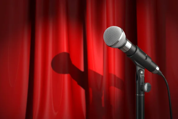 Microphone on stage with red curtain. Music or performance  conc — Stock Photo, Image