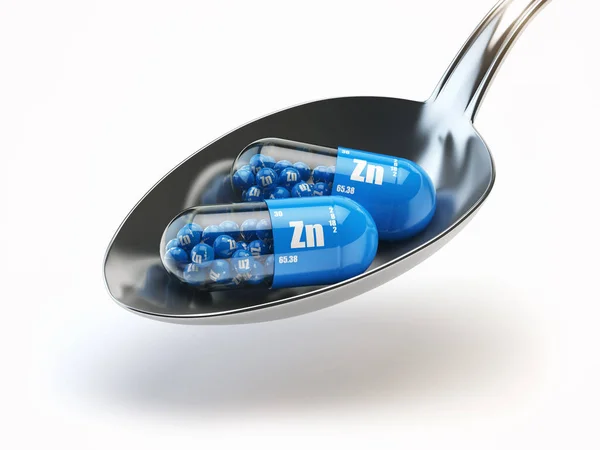 Pillole con elemento zinco Zn nel cucchiaio. Integratori alimentari. Vi — Foto Stock