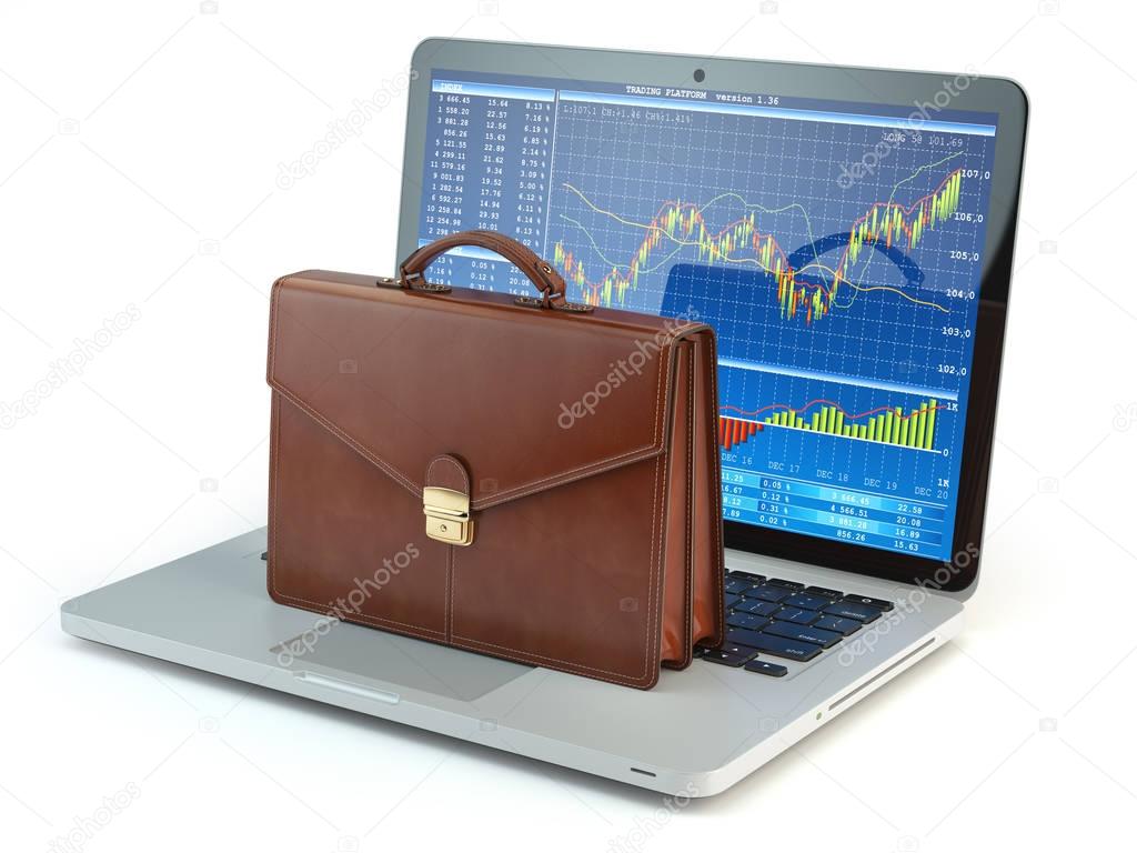Stock market online business concept. Briefcase on laptop keyboa
