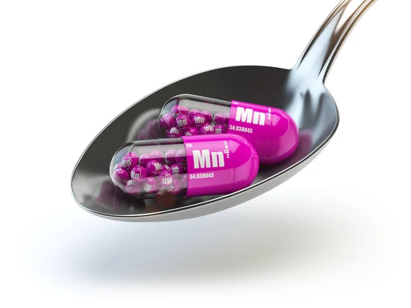 Pills with manganese MN element in the spoon. Dietary supplement — Stock Photo, Image