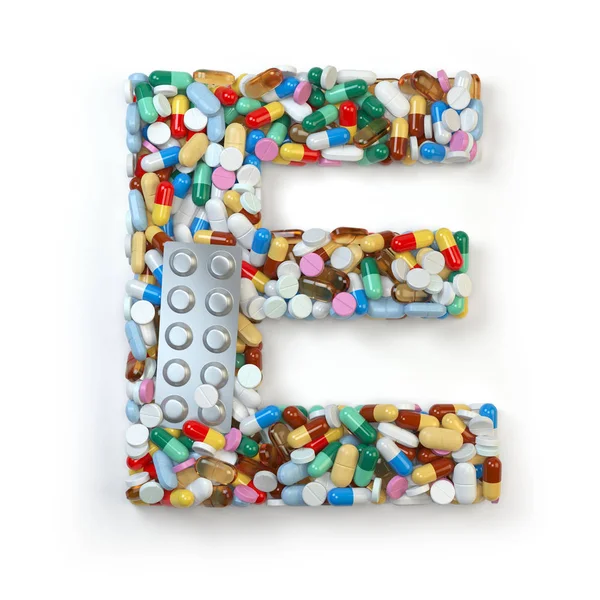 Письмо Е. Набор лекарственных таблеток, капсул, таблеток — стоковое фото