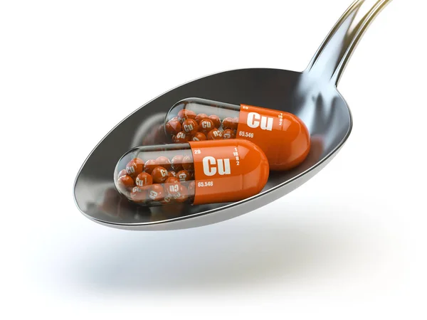 Pills with Cu copper element in the spoon. Dietary supplements. — Stock Photo, Image