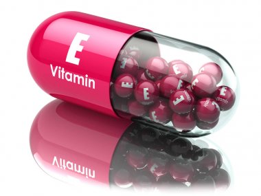 E vitamini kapsülü veya hap. Diyet takviyeleri.
