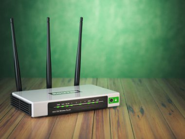 Wi-Fi Kablosuz internet yönlendirici ahşap masa ve yeşil bac