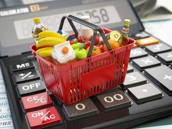 Shopping basket full of grocery foods on calculator. Savings, di — Stock Photo, Image