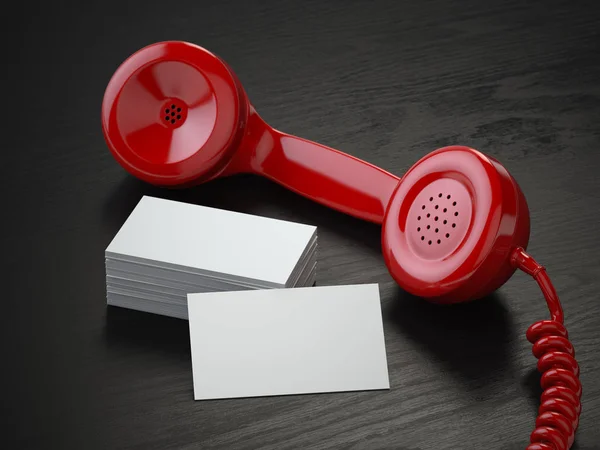 Mockup de cartões de visita em branco e receptor de telefone retro vermelho o — Fotografia de Stock