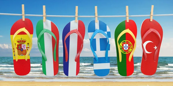 Hanging flip flops in colors of flags of  different mediterranea — Stock Photo, Image