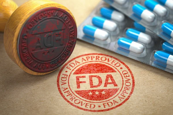 Concetto approvato dalla FDA. Timbro di gomma con FDA e pillole su mestiere — Foto Stock