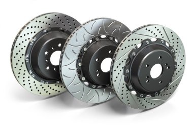  Arka arkaya delinmiş ve yerleştirilmiş fren diskleri. Farklı tip fren diskleri. 3d illüstrasyon