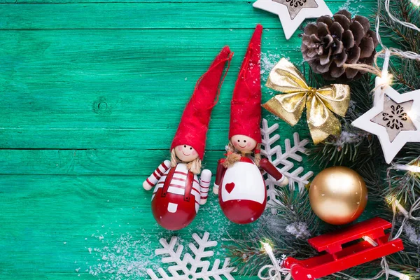 Christmas decoration on wooden emerald background