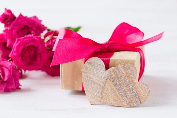 Wooden Hearts Gift Pink Bow Pink Roses White Wooden Background — Stock Photo, Image