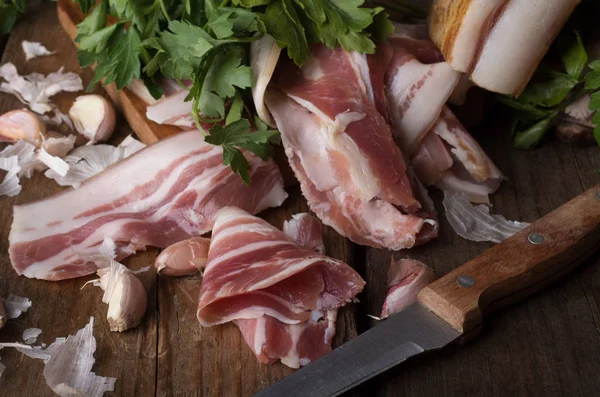Bacon on wooden board — Stock Photo, Image