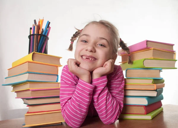 Mladá dívka s knihami — Stock fotografie
