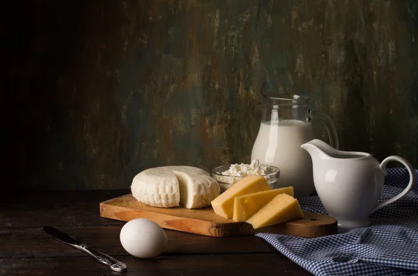 Dairy products on kitchen table — Stock Photo, Image