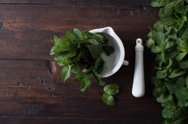 peppermint leaves in a mortar