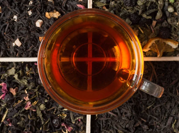 Various types of tea on a wooden background — Stok fotoğraf