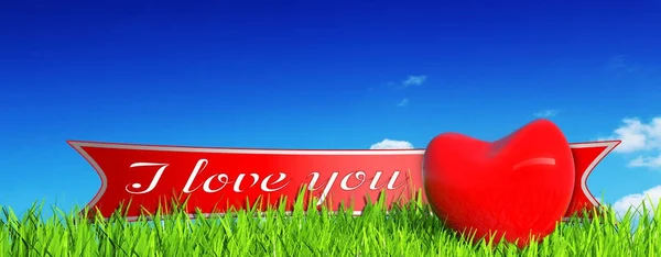 Red heart on grass — Stok fotoğraf