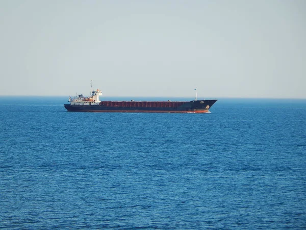 Dry cargo ship in the Caspian Sea. Ship departed from the port of Aktau. Kazakhstan. Caspian Sea. Kazakhstan. Mangistau region. 11 July 2019 year.