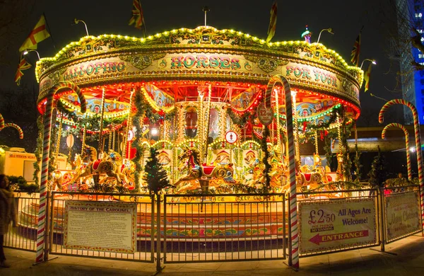 Merry-go-round in the Christmas market in the Southbank Centre, London England — Stock Photo, Image