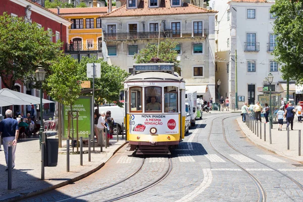 People walking by the tram line in the center of Lisbon, Portugal — Stock Photo, Image