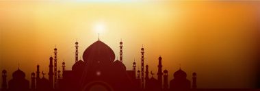 Akşam arka plan üzerinde cami silueti ile Web banner. 