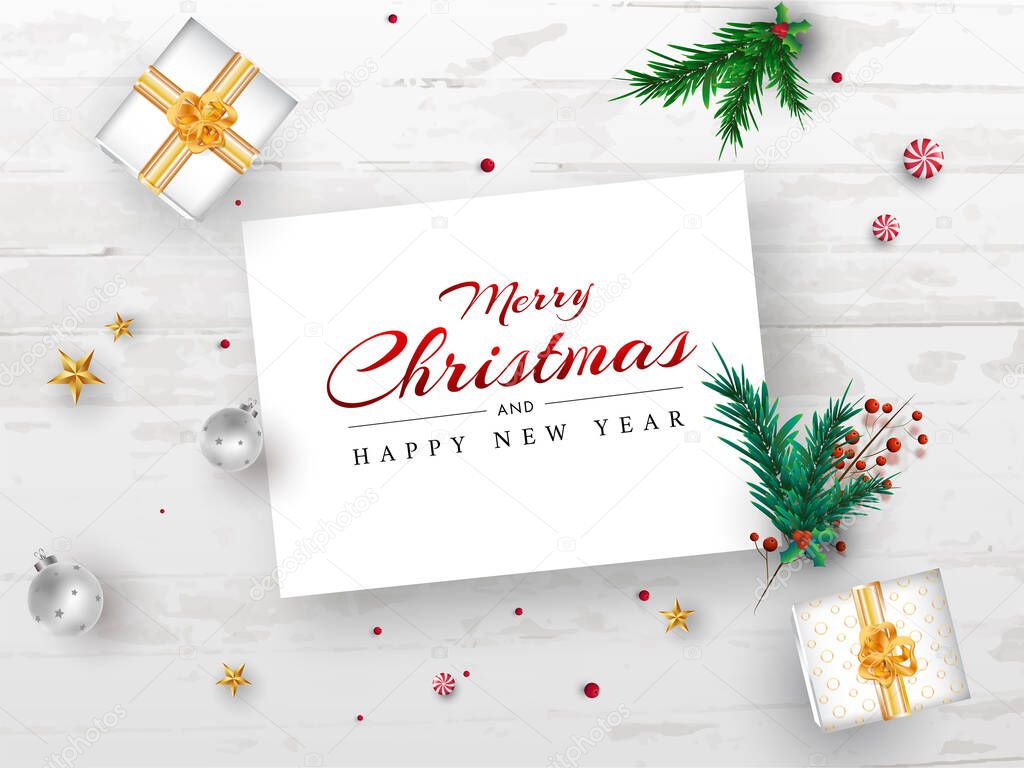 Merry Christmas and Happy New Year message card with pine leaves