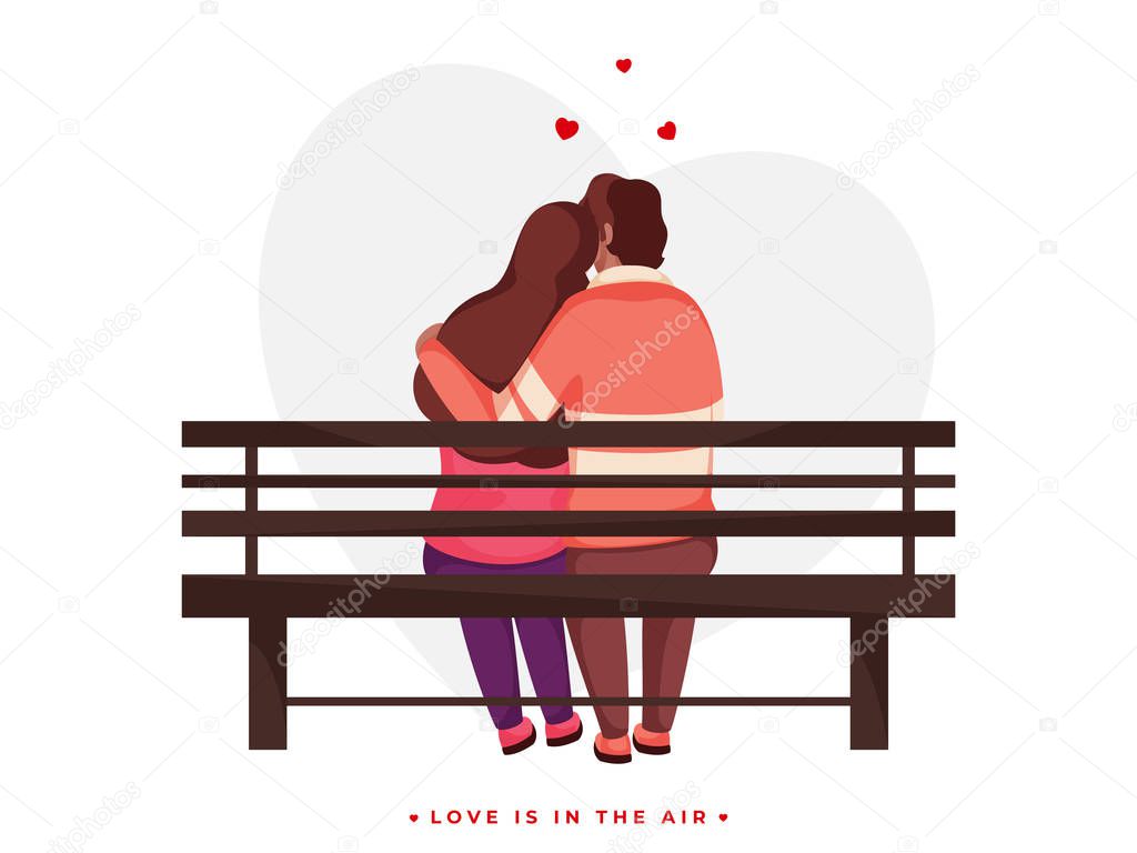 Back View of Loving Couple Hugging Sit on Bench for Love is in t